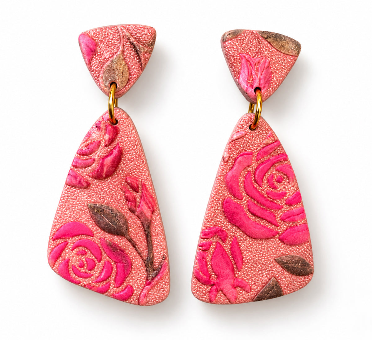 Rosa Coral handmade polymer clay earrings with pink rose design on a coral base, shown on a white background